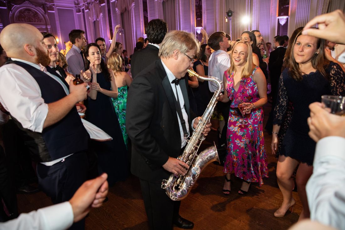 big-ray-and-the-kool-kats-saxaphone-player-playing-in-the-middle-of-crowd